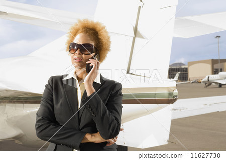 African American businesswoman talking on cell phone 11627730