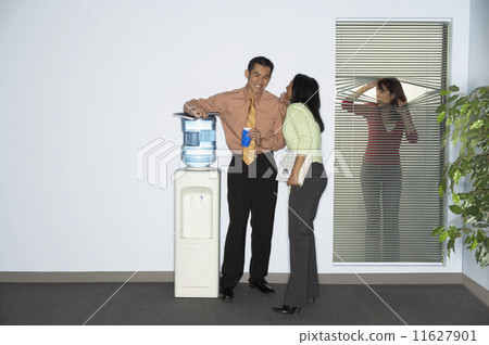 Businesswoman spying on coworkers 11627901