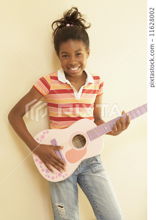 African American girl playing guitar 11628002