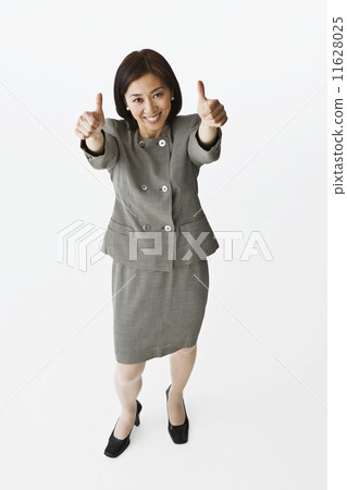 Asian businesswoman giving thumbs up Asian businesswoman giving thumbs up 11628025