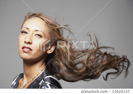 Native American woman with hair blowing 11628137