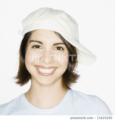 Mixed Race woman wearing sideways painter's hat 11628160