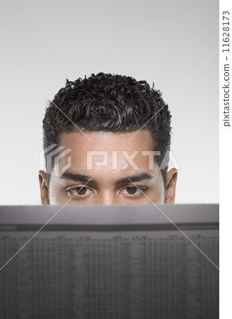 Man reading newspaper 11628173