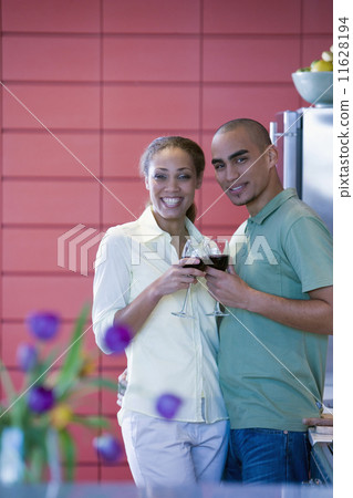 African American couple drinking wine African American couple drinking wine 11628194