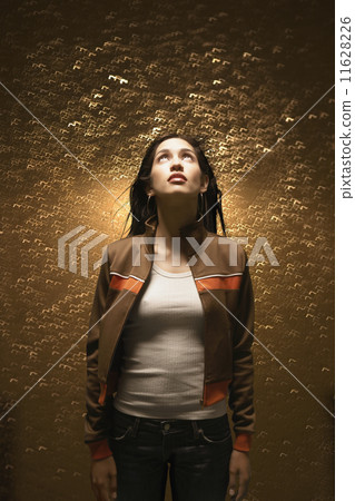 Woman surrounded by water droplets Woman surrounded by water droplets 11628226