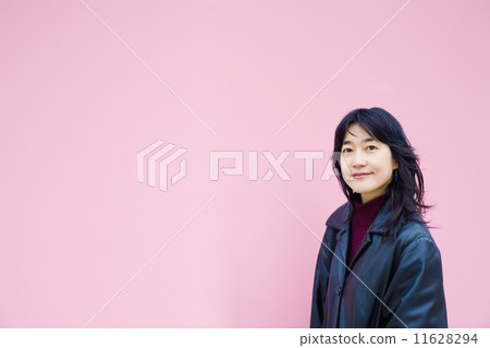 Asian woman wearing jacket 11628294
