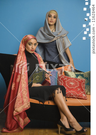 Middle Eastern women wearing head scarves Middle Eastern women wearing head scarves 11628464