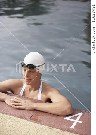 Cape Verdean woman in swimming pool Cape Verdean woman in swimming pool 11628481
