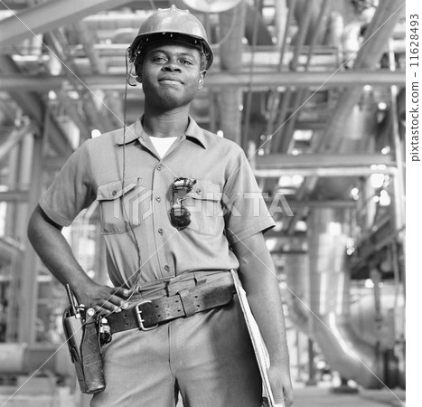 African American male welder with clipboard 11628493