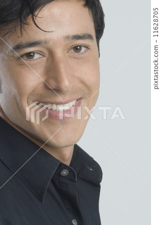 Close up of Hispanic man smiling Close up of Hispanic man smiling 11628705