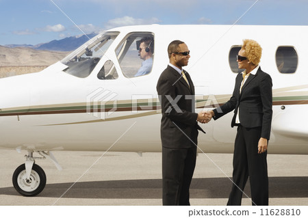 African American businesspeople shaking hands 11628810