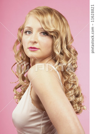 Studio shot of woman in nightgown 11628821