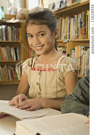 Pacific Islander girl in library 11628938
