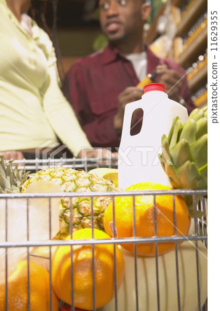 Shopping cart with groceries Shopping cart with groceries 11629355