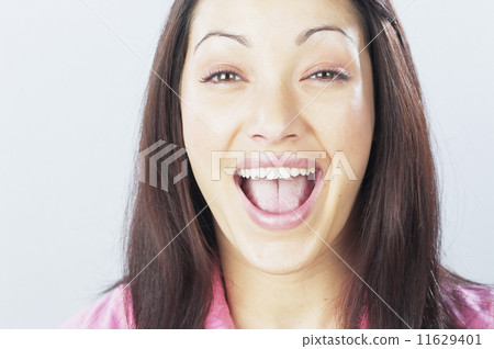 Close up of young woman laughing 11629401