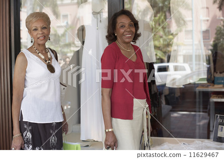 Senior African American women window shopping 11629467