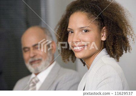 African businesswoman with curly hair African businesswoman with curly hair 11629537