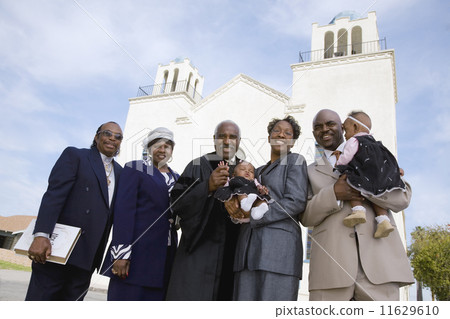 African family in front of church 11629610