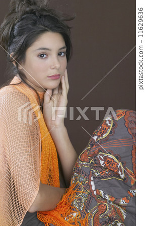 Hispanic girl with hand on face Hispanic girl with hand on face 11629636