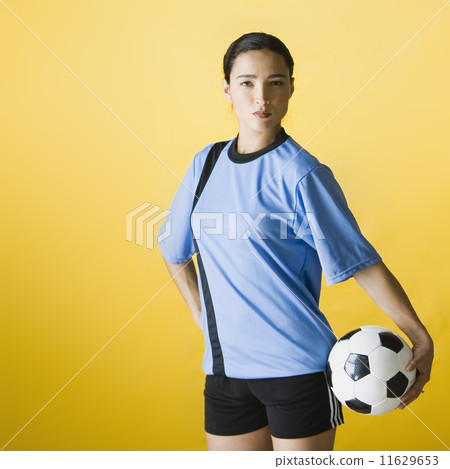 Hispanic woman holding soccer ball Hispanic woman holding soccer ball 11629653
