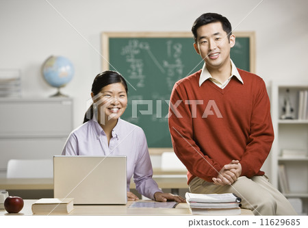 Asian teachers in classroom Asian teachers in classroom 11629685