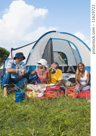 Multi-ethnic friends camping 11629722