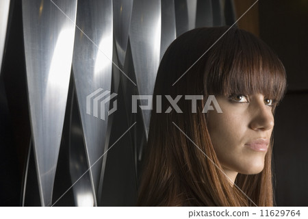 Close up of young woman with long hair Close up of young woman with long hair 11629764