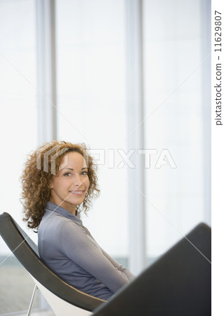 African woman sitting in chair African woman sitting in chair 11629807