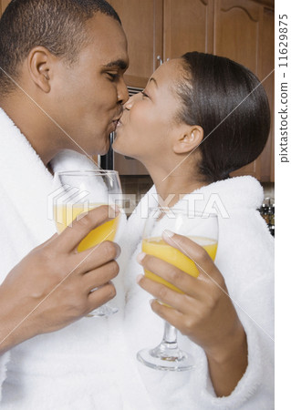 African couple kissing 11629875