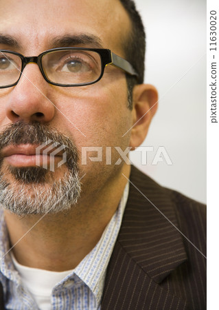 Hispanic businessman wearing eyeglasses Hispanic businessman wearing eyeglasses 11630020