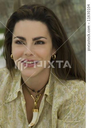 Close up of Hispanic woman smiling Close up of Hispanic woman smiling 11630104