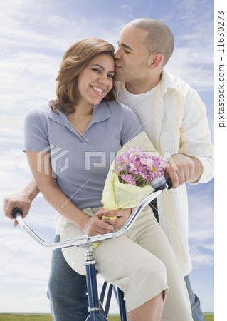 African American couple on bicycle 11630273