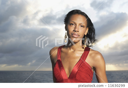Mixed Race women wearing evening gown Mixed Race women wearing evening gown 11630299