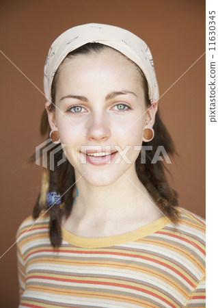Young woman with dreadlocks Young woman with dreadlocks 11630345