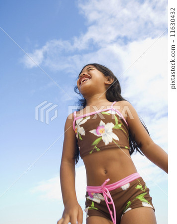 Pacific Islander girl wearing bathing suit 11630432