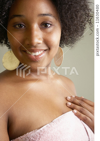 African woman wrapped in towel 11630480