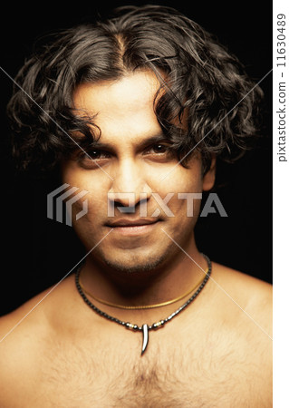 Indian man wearing necklace 11630489