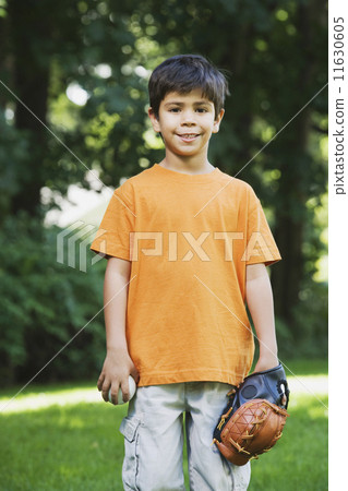 Hispanic boy with baseball glove and ball Hispanic boy with baseball glove and ball 11630605
