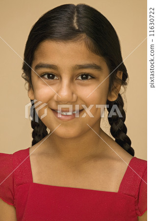 Close up of Hispanic girl smiling 11630722