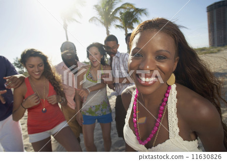 Hispanic woman with friends in background 11630826