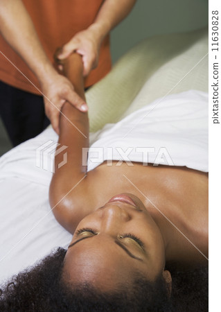 African woman receiving massage African woman receiving massage 11630828