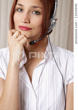 Native American businesswoman wearing headset Native American businesswoman wearing headset 11630846