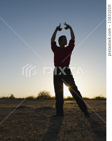 Hispanic male flamenco dancer posing Hispanic male flamenco dancer posing 11631010