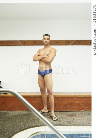 Mixed Race man wearing bathing suit Mixed Race man wearing bathing suit 11631170