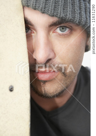 Hispanic man wearing wool hat 11631290