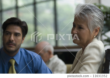 Hispanic businesspeople at meeting Hispanic businesspeople at meeting 11631352