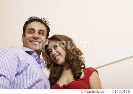 Low angle view of Multi-ethnic couple 11631456