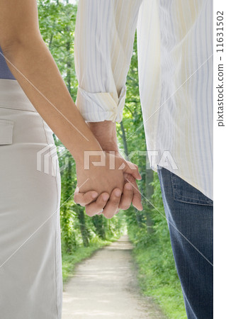 African American couple holding hands 11631502