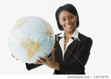 African businesswoman holding globe 11631679