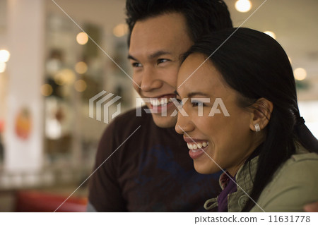 Asian couple hugging Asian couple hugging 11631778